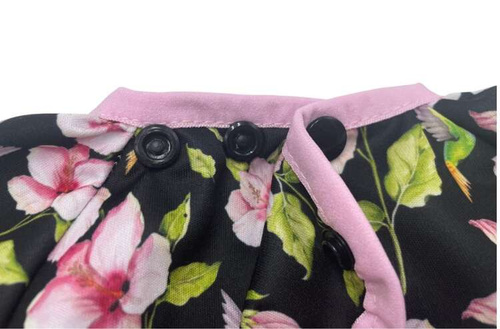 Long sleeved bib, waterproof, with built-in pocket bag In the HUMMINGBIRDS